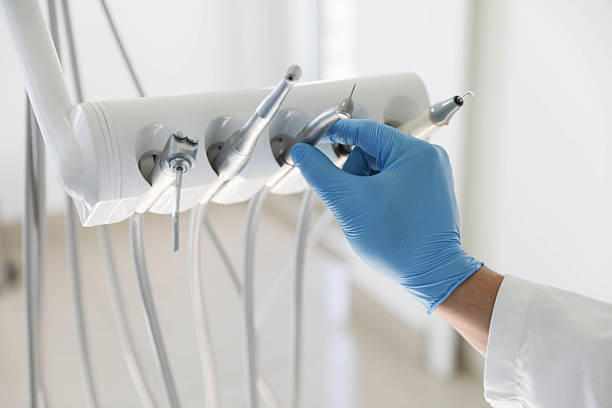Professional Tooth Extraction technician working in Peabody, MA